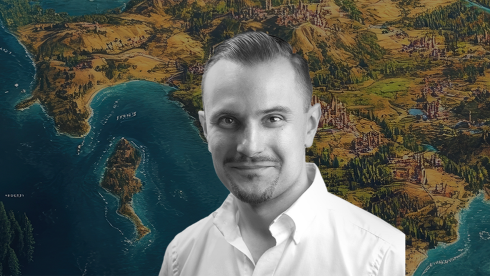 Zdjęcie portretowe dra Krzysztofa Maja na kolorowym tle